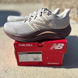 New Balance Gray and Purple Athletic Shoes with FuelCell Technology